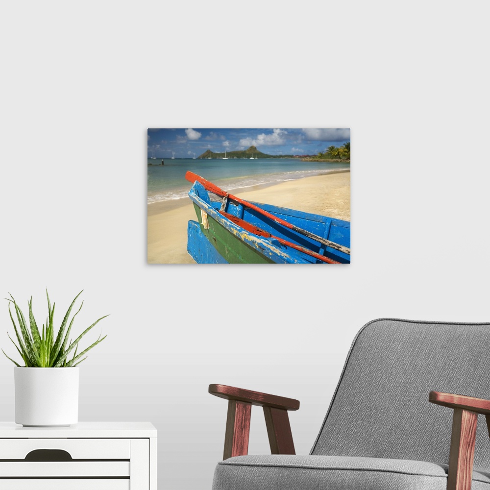 A modern room featuring Saint Lucia, Caribbean, Boat on the beach, Pigeon Island in background