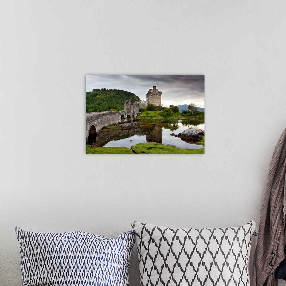A bohemian room featuring Scotland, Highland, Eilean Donan Castle, Dornie village, Loch Duich bay