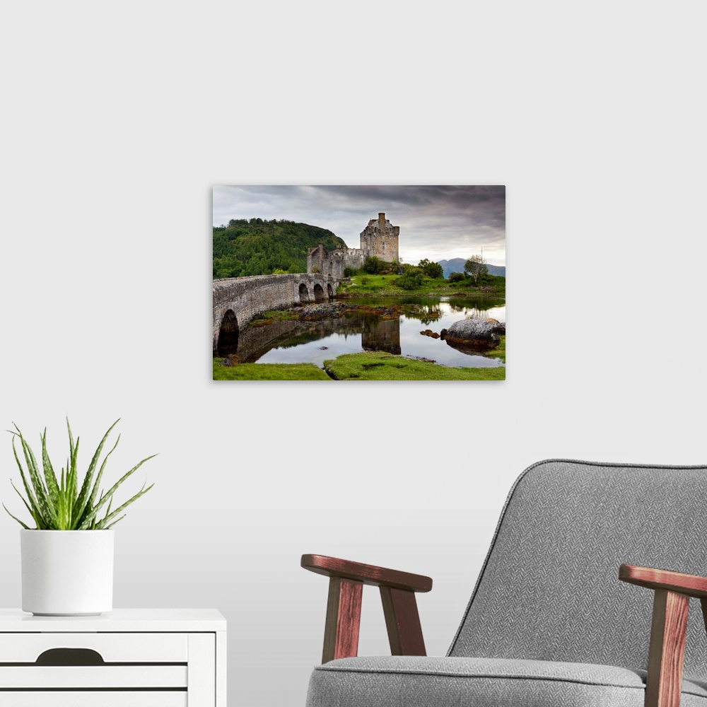 A modern room featuring Scotland, Highland, Eilean Donan Castle, Dornie village, Loch Duich bay