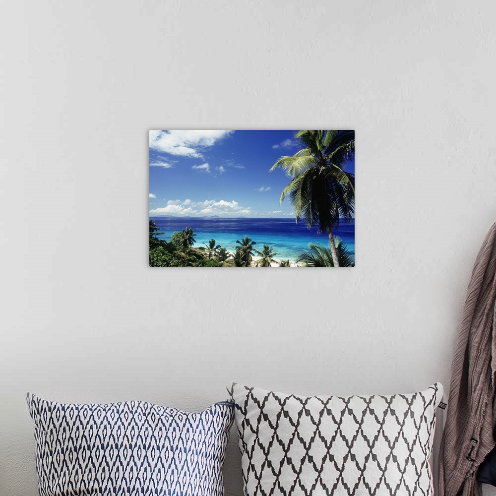 A bohemian room featuring Seychelles, Fregate, Fregate Island, palms and sea.