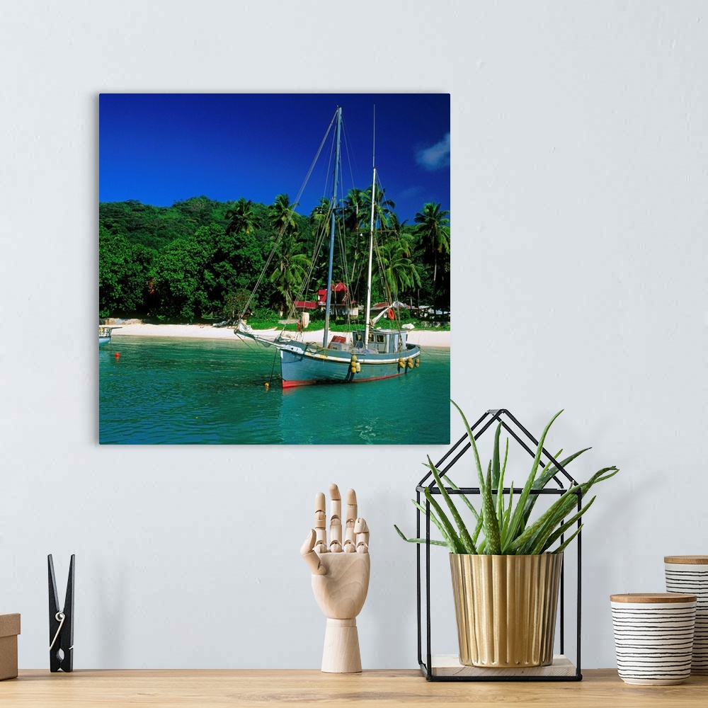 A bohemian room featuring Seychelles, La Digue, sailing boat in the small harbor