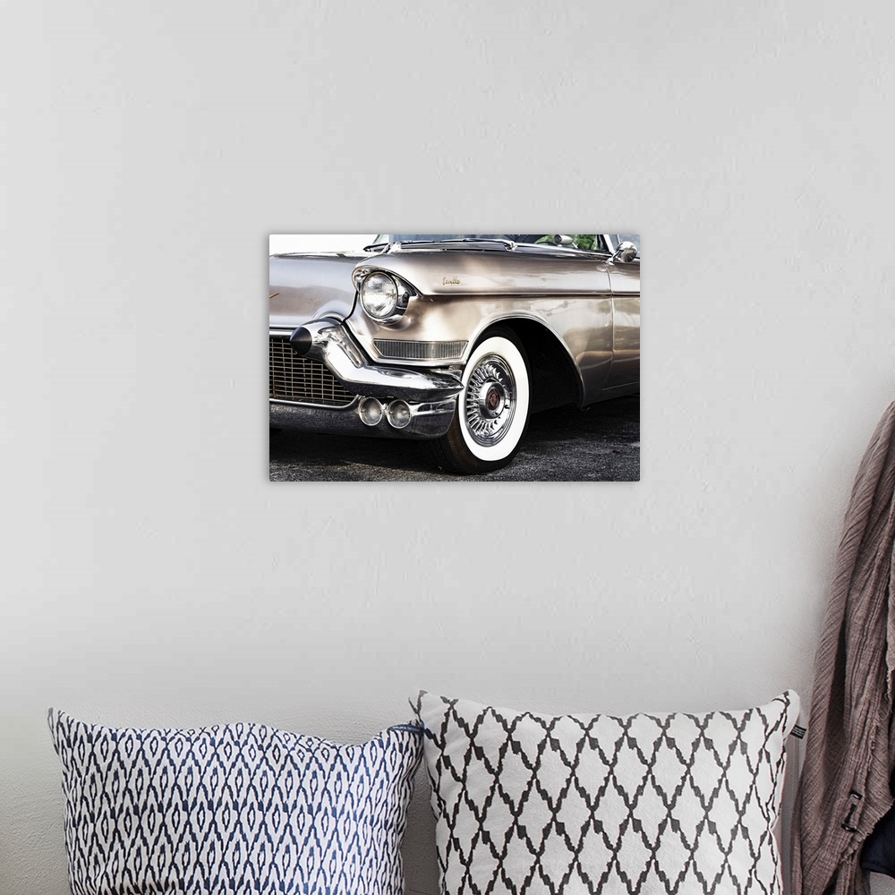 A bohemian room featuring Side view of 1950's Cadillac Seville.