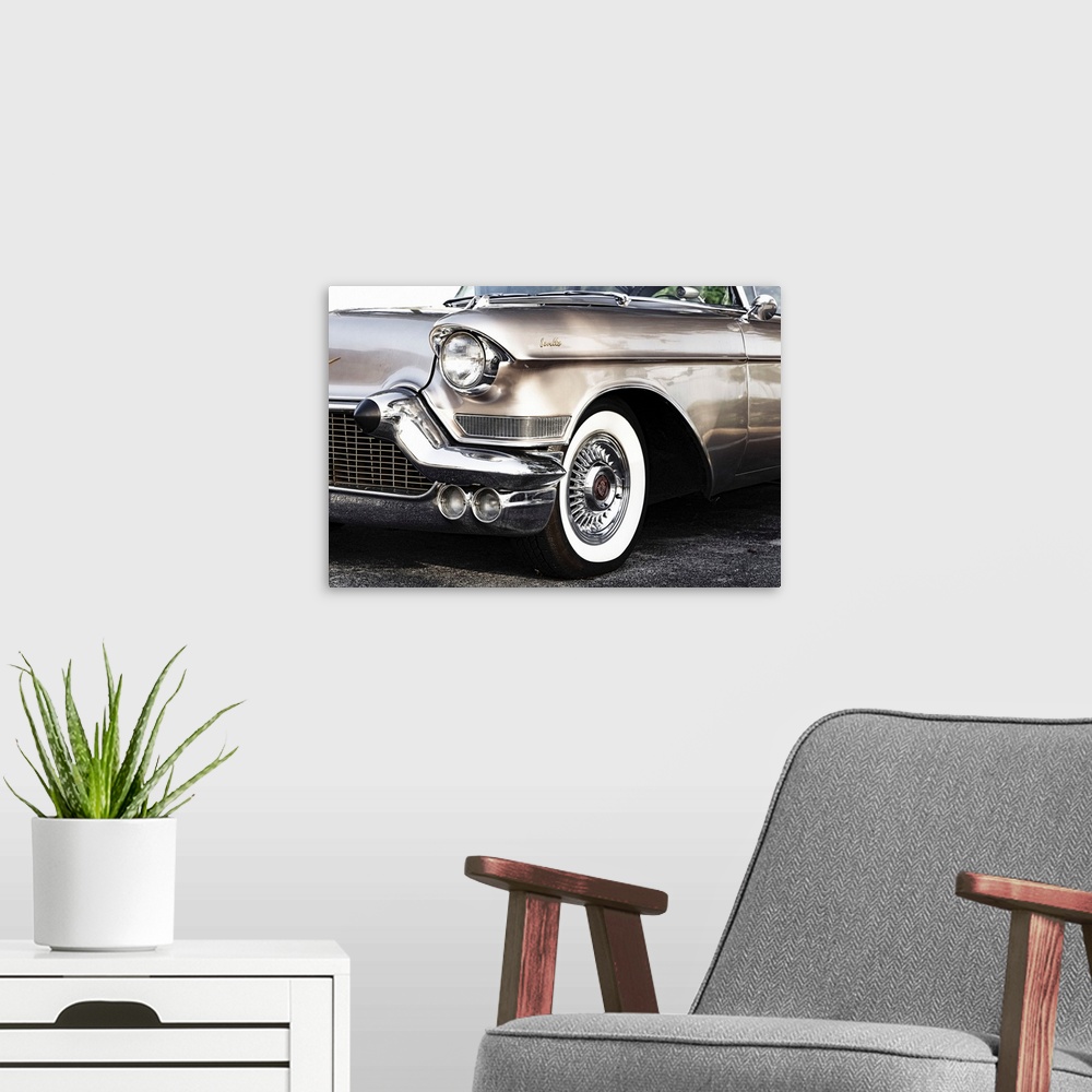A modern room featuring Side view of 1950's Cadillac Seville.