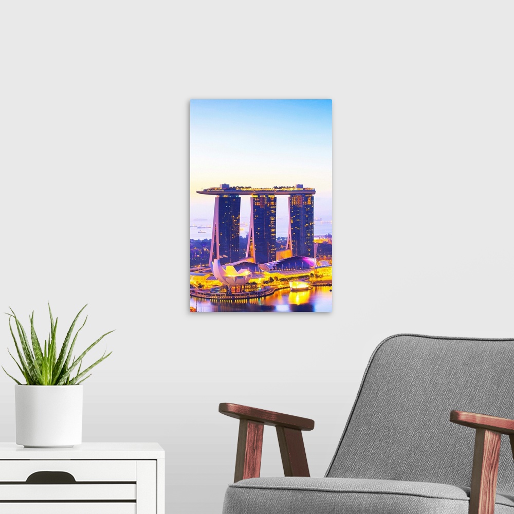 A modern room featuring Singapore, Singapore City, Marina Bay Sands and marina at sunrise.