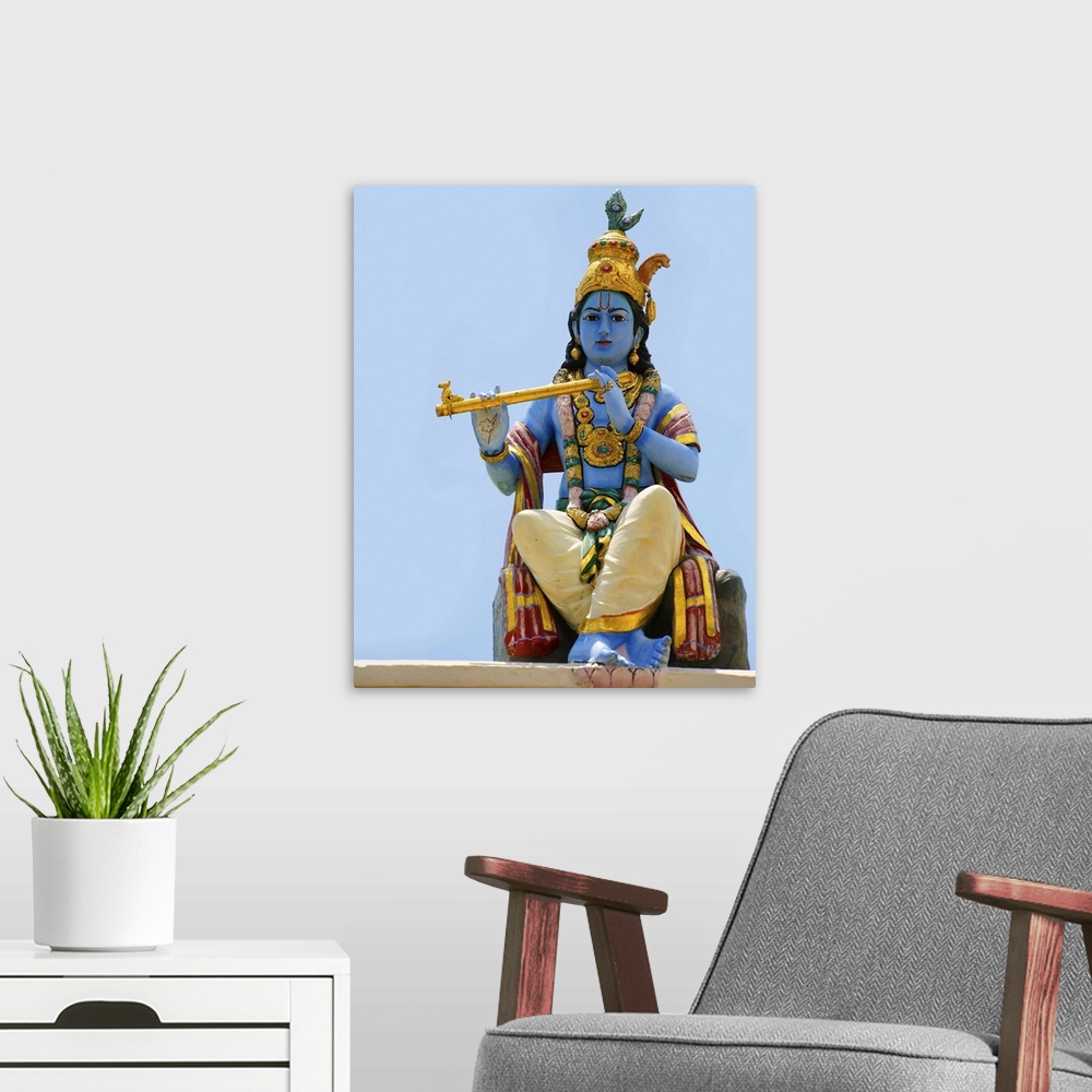 A modern room featuring Singapore, Little India, Shiva statue