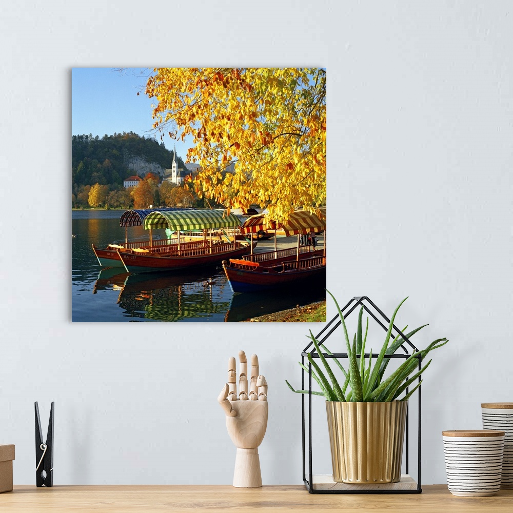 A bohemian room featuring Slovenia, Upper Carniola, Alps, Julian Alps, Bled, Bled lake, typical boats