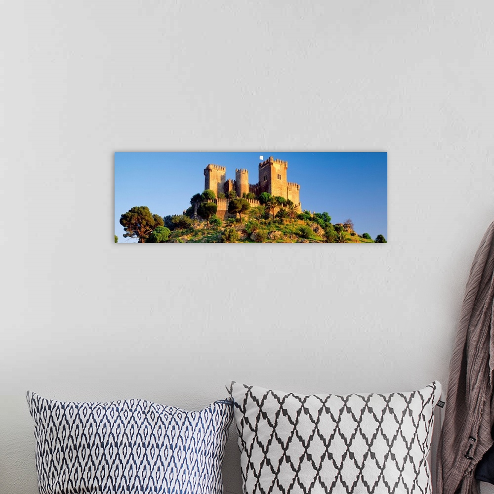 A bohemian room featuring Spain, Andalucia, Cordoba, Palma del Rio town, Almodovar del Rio castle