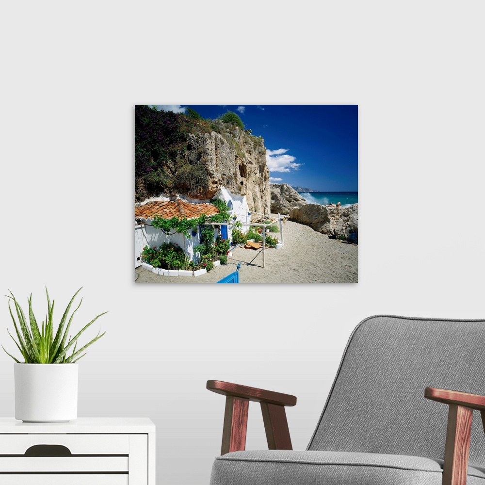 A modern room featuring Spain, Andalucia, Malaga, Nerja, typical beach