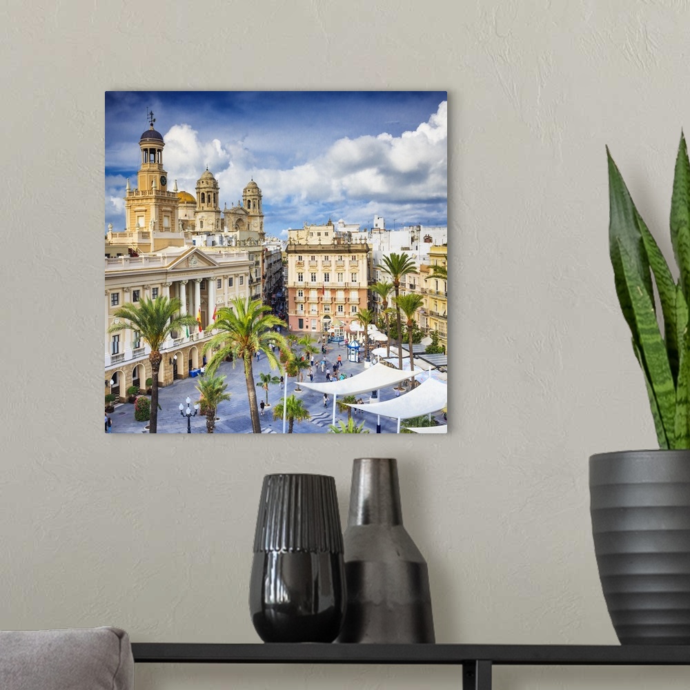 A modern room featuring Spain, Andalusia, Cadiz district, Cadiz, Plaza San Juan de Dios with the townhall