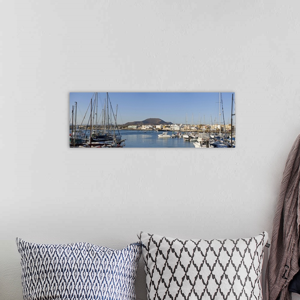 A bohemian room featuring Spain, Canary Islands, Fuerteventura, Corralejo, View of the village
