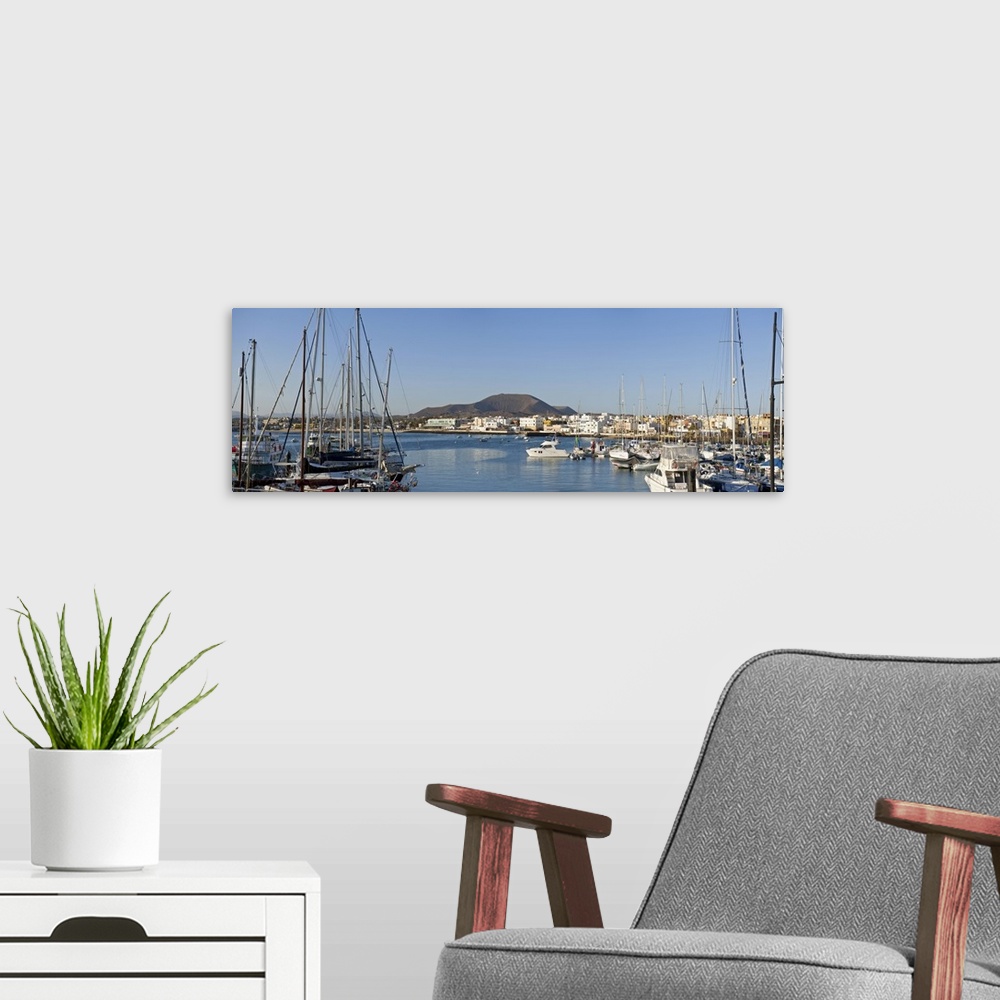 A modern room featuring Spain, Canary Islands, Fuerteventura, Corralejo, View of the village