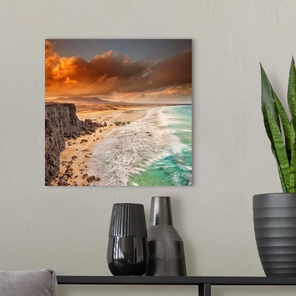A modern room featuring Spain, Canary Islands, Fuerteventura, El Cotillo, Beach and rugged coastline at dawn