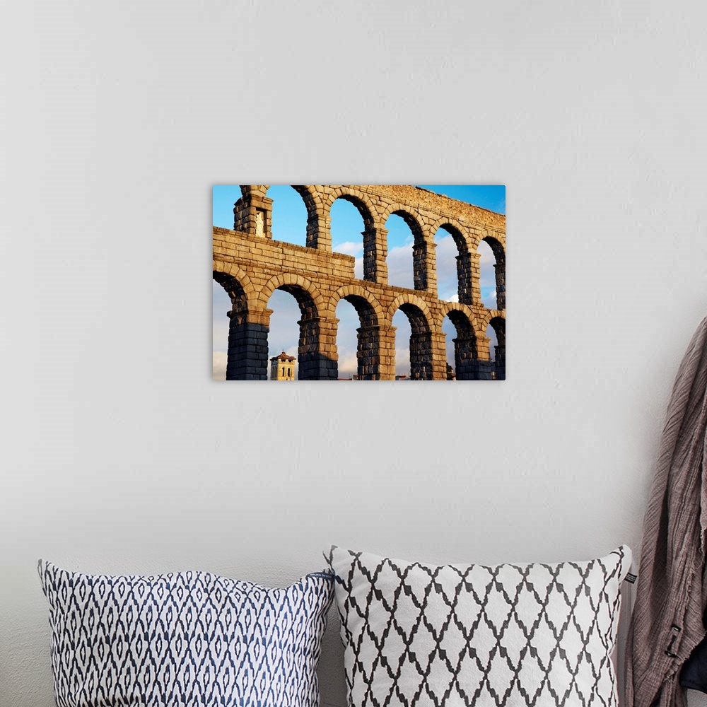 A bohemian room featuring Spain, Castilla y Leon, Segovia, View of roman aqueduct