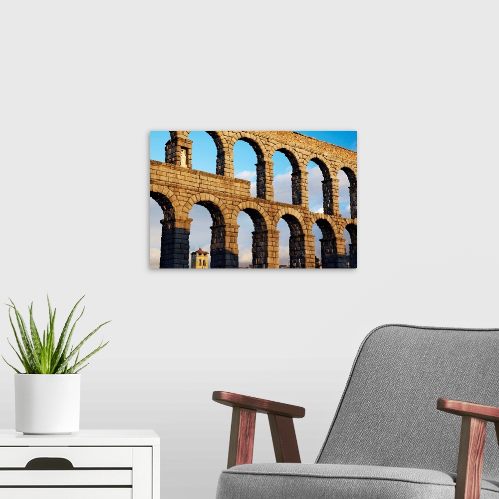 A modern room featuring Spain, Castilla y Leon, Segovia, View of roman aqueduct