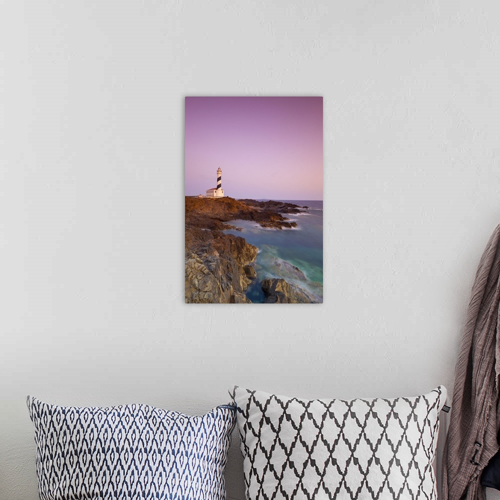 A bohemian room featuring Spain, Minorca, Far de Favaritx lighthouse and rugged coastline at dawn