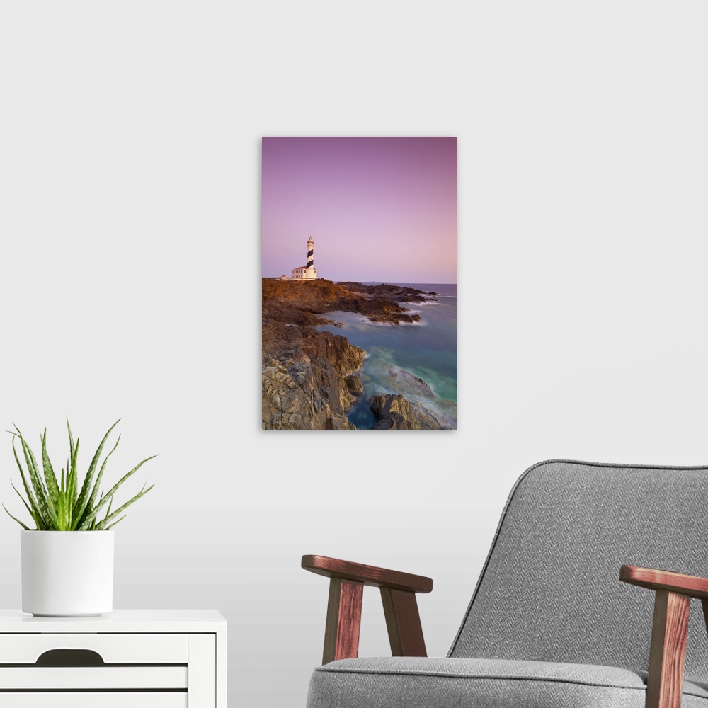 A modern room featuring Spain, Minorca, Far de Favaritx lighthouse and rugged coastline at dawn