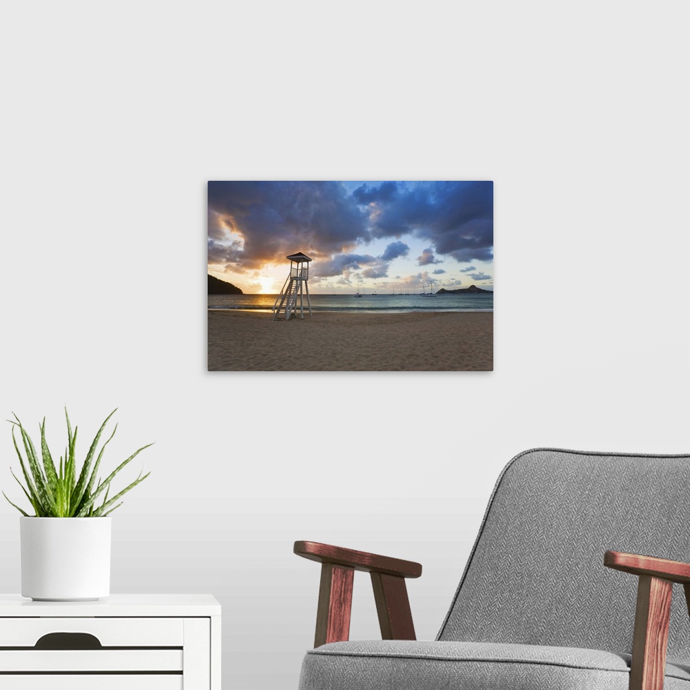 A modern room featuring St Lucia, Gros Islet, Rodney Bay, Reduit Beach sunset, Pigeon Island in the background