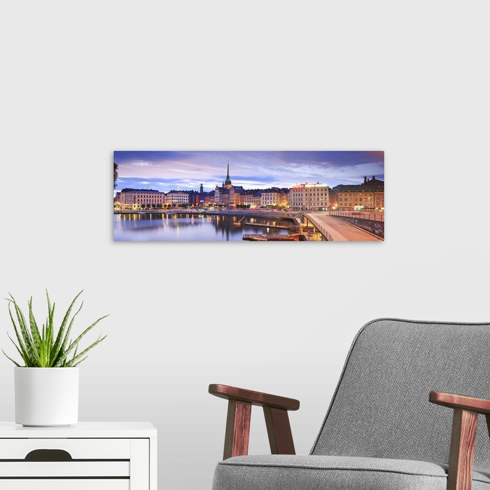 A modern room featuring Sweden, Stockholm, Scandinavia, Gamla Stan, Malar Lake and the old town at sunset.