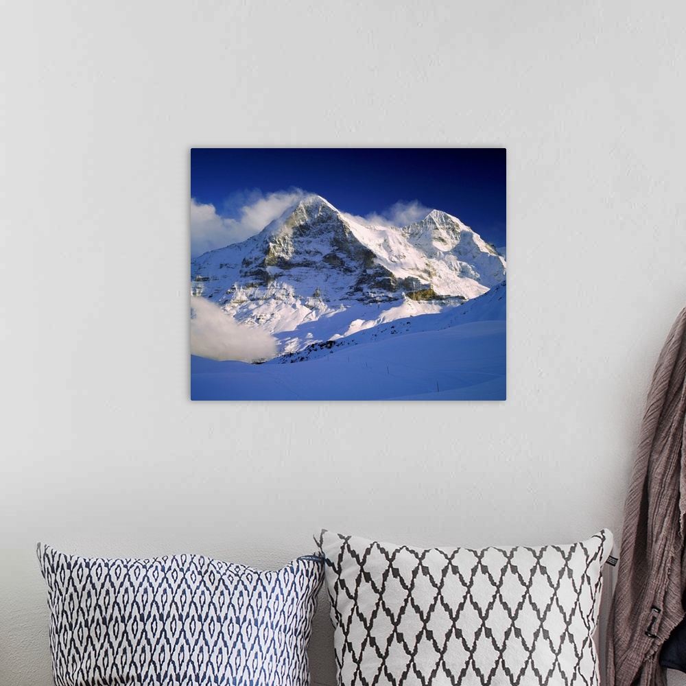 A bohemian room featuring Switzerland, Bern, View towards Eiger and Monch mountains near Grindelwald village