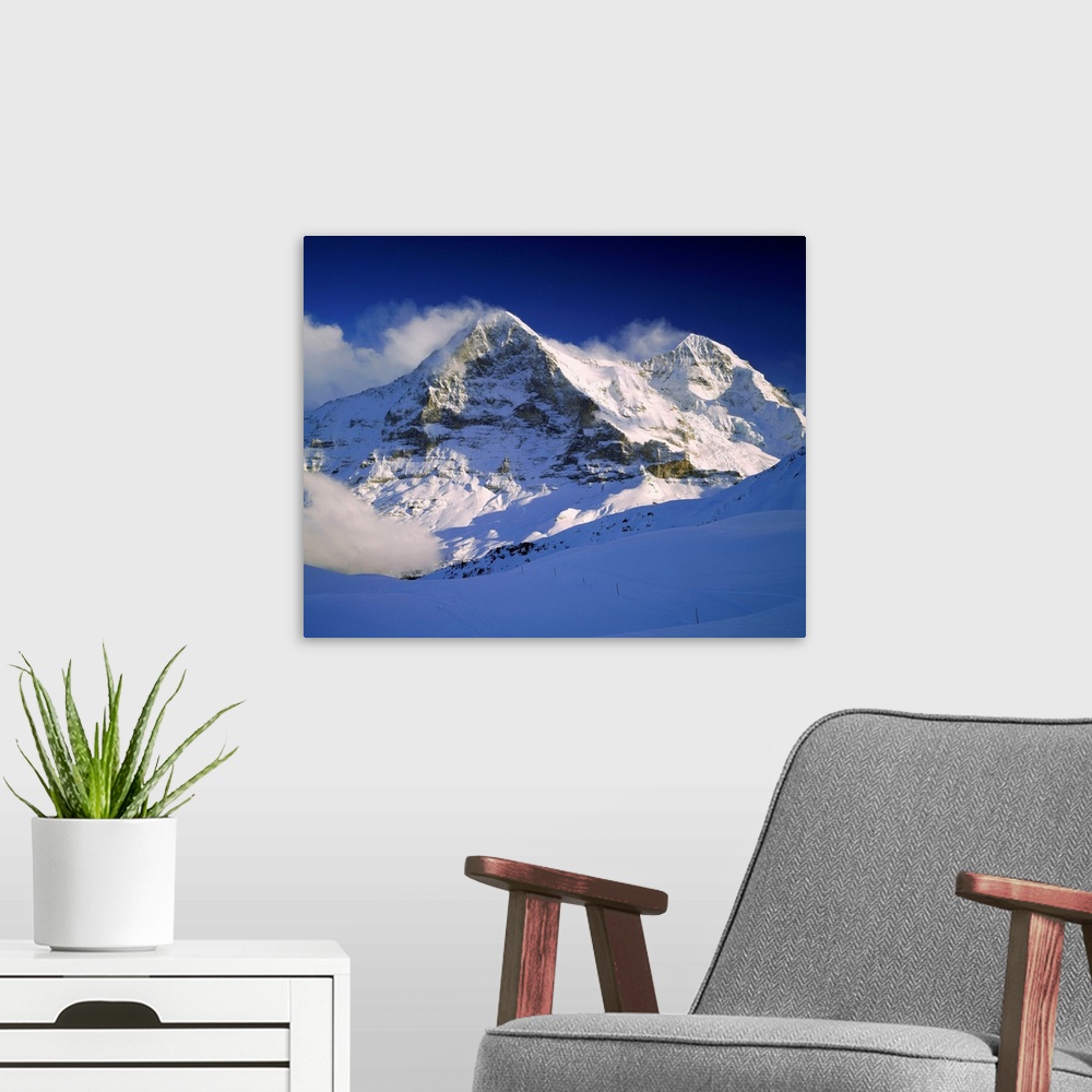 A modern room featuring Switzerland, Bern, View towards Eiger and Monch mountains near Grindelwald village