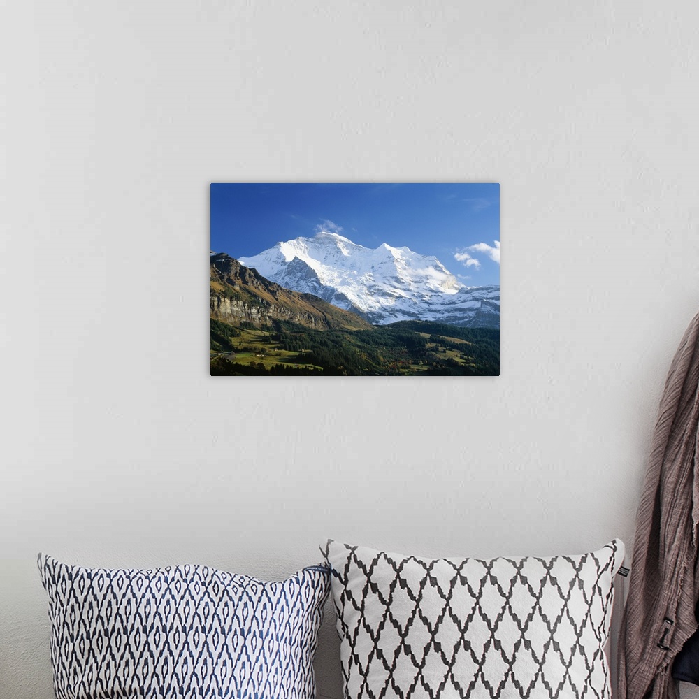 A bohemian room featuring Switzerland, Bern, View towards Wengen village, Eiger, Monch and Jungfrau mountains