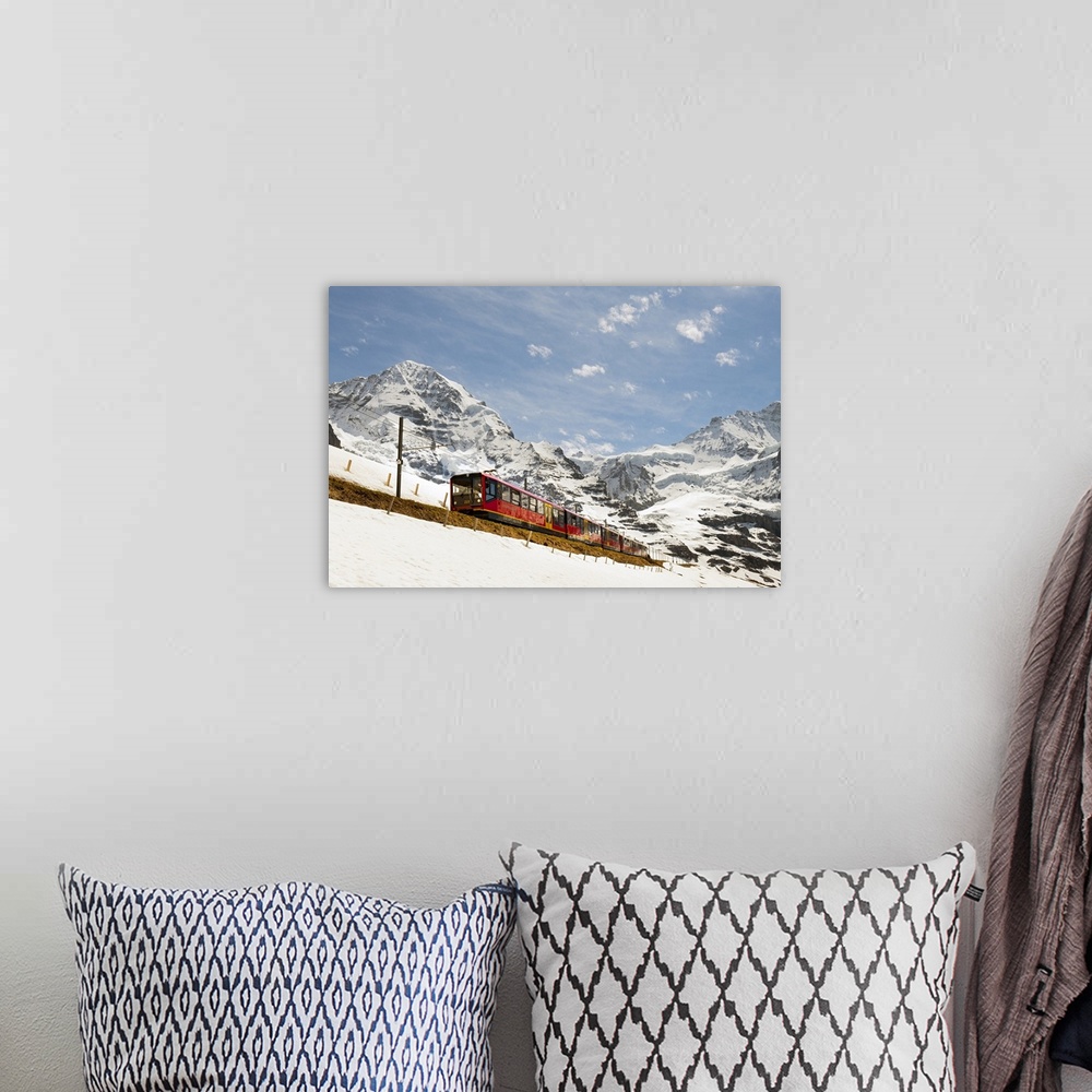 A bohemian room featuring Switzerland, Bern, Berner Oberland, Alps, Bernese Oberland, Jungfraujoch, Train passing through t...