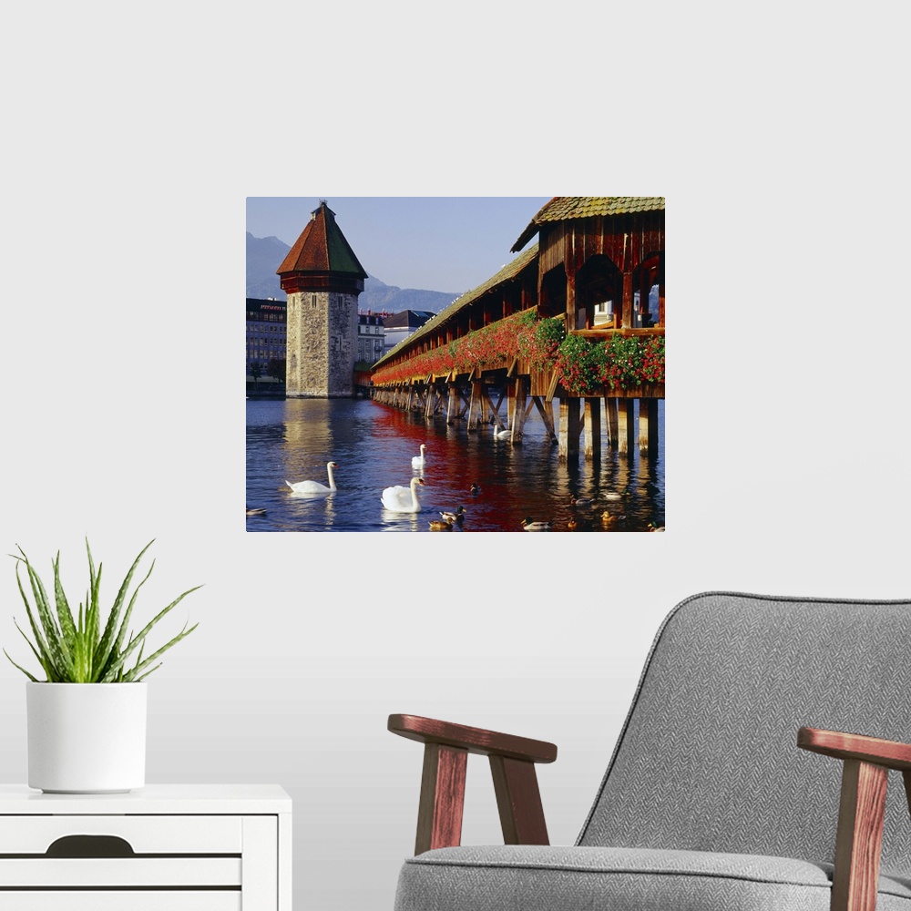 A modern room featuring Switzerland, the covered wooden bridge and octagonal water tower