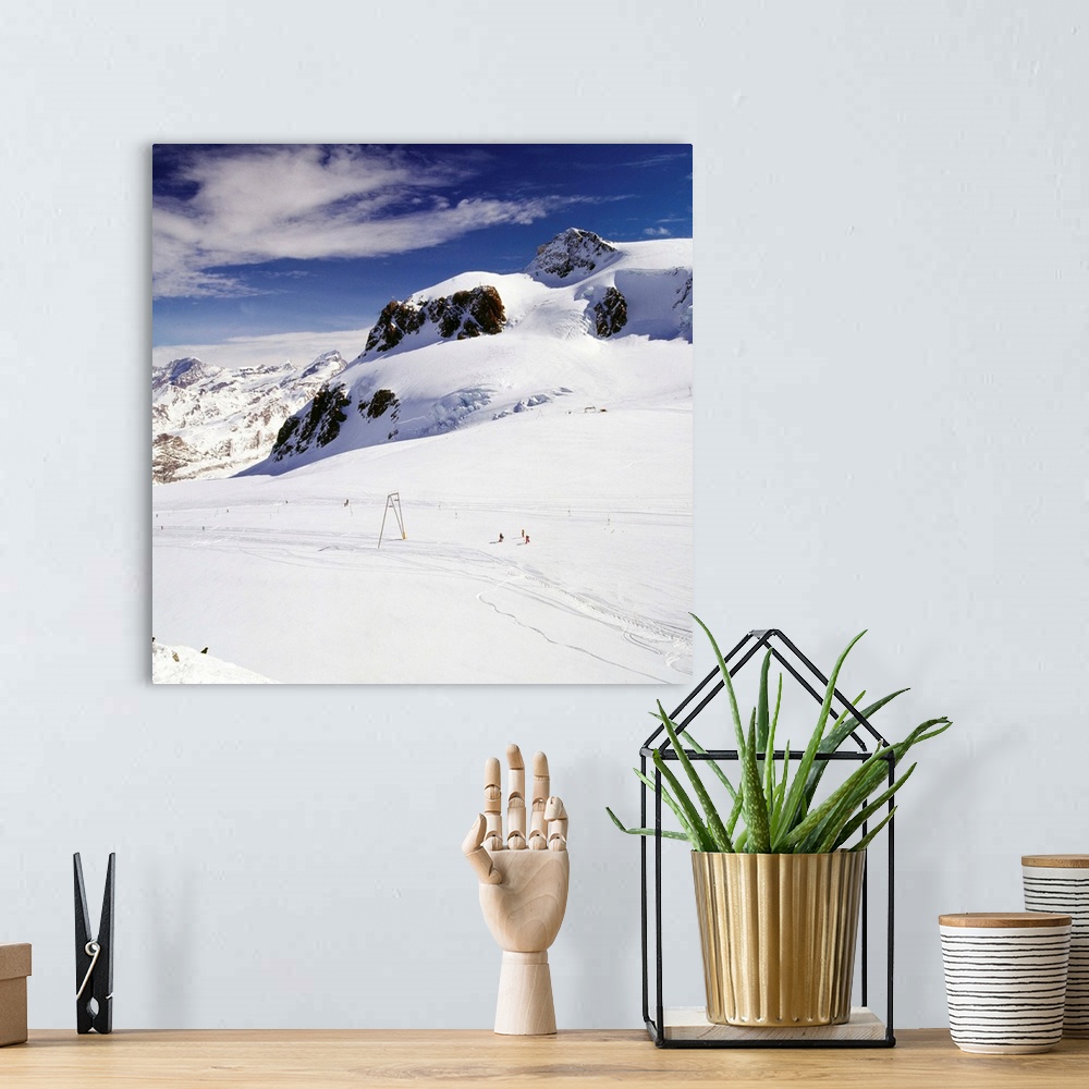 A bohemian room featuring Switzerland, Valais, Zermatt, Plateau Rosa ski area towards Klein Matterhorn