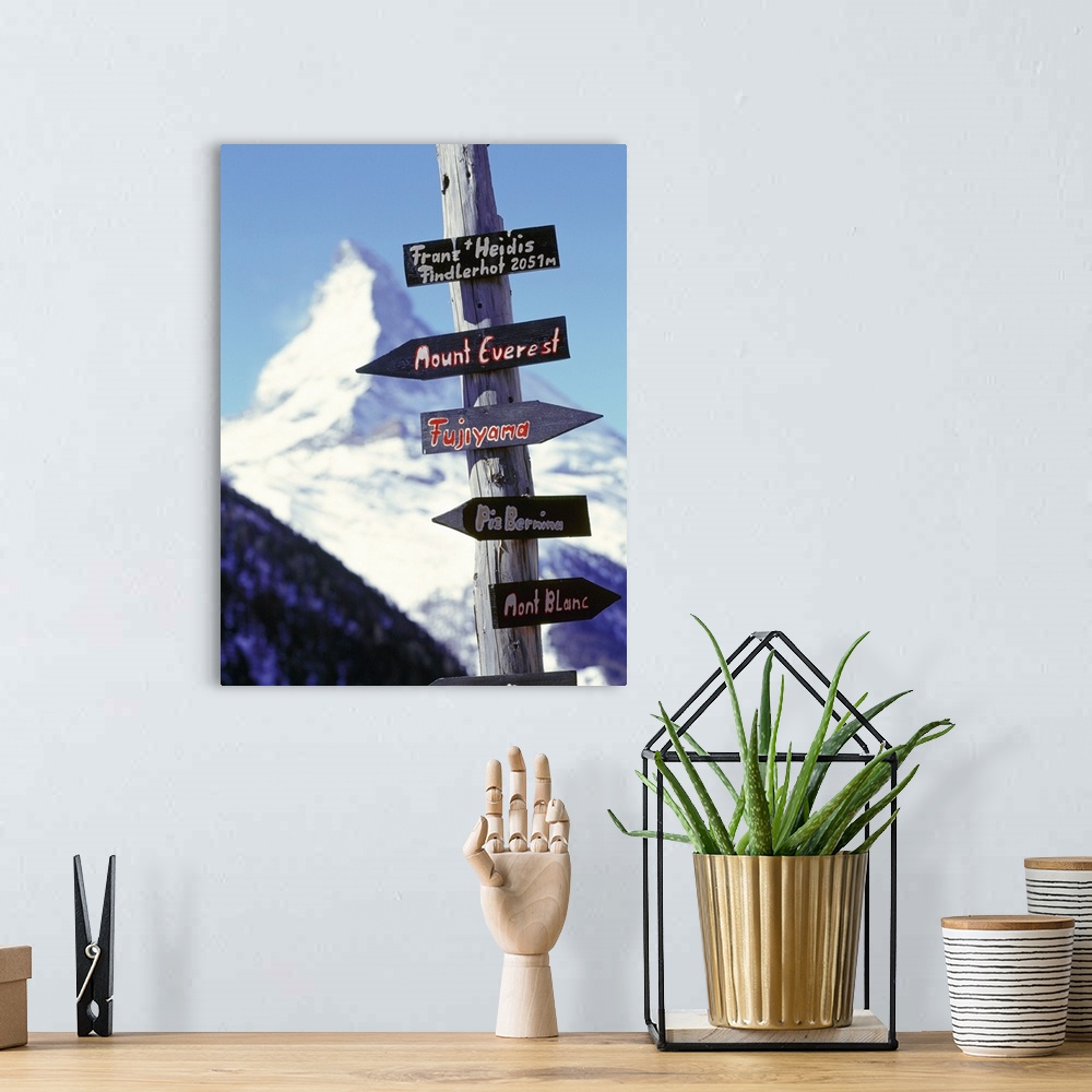 A bohemian room featuring Switzerland, Valais, Zermatt, road signs and Matterhorn mountain in background