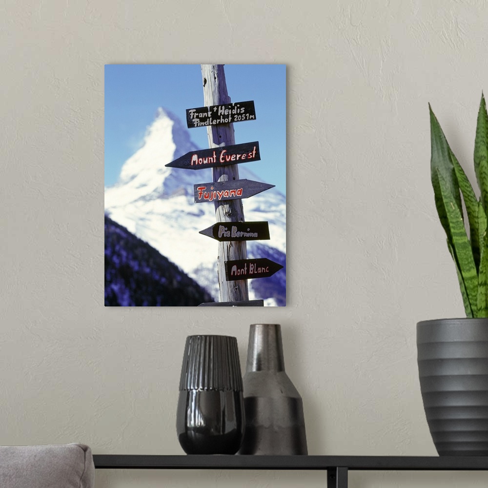 A modern room featuring Switzerland, Valais, Zermatt, road signs and Matterhorn mountain in background