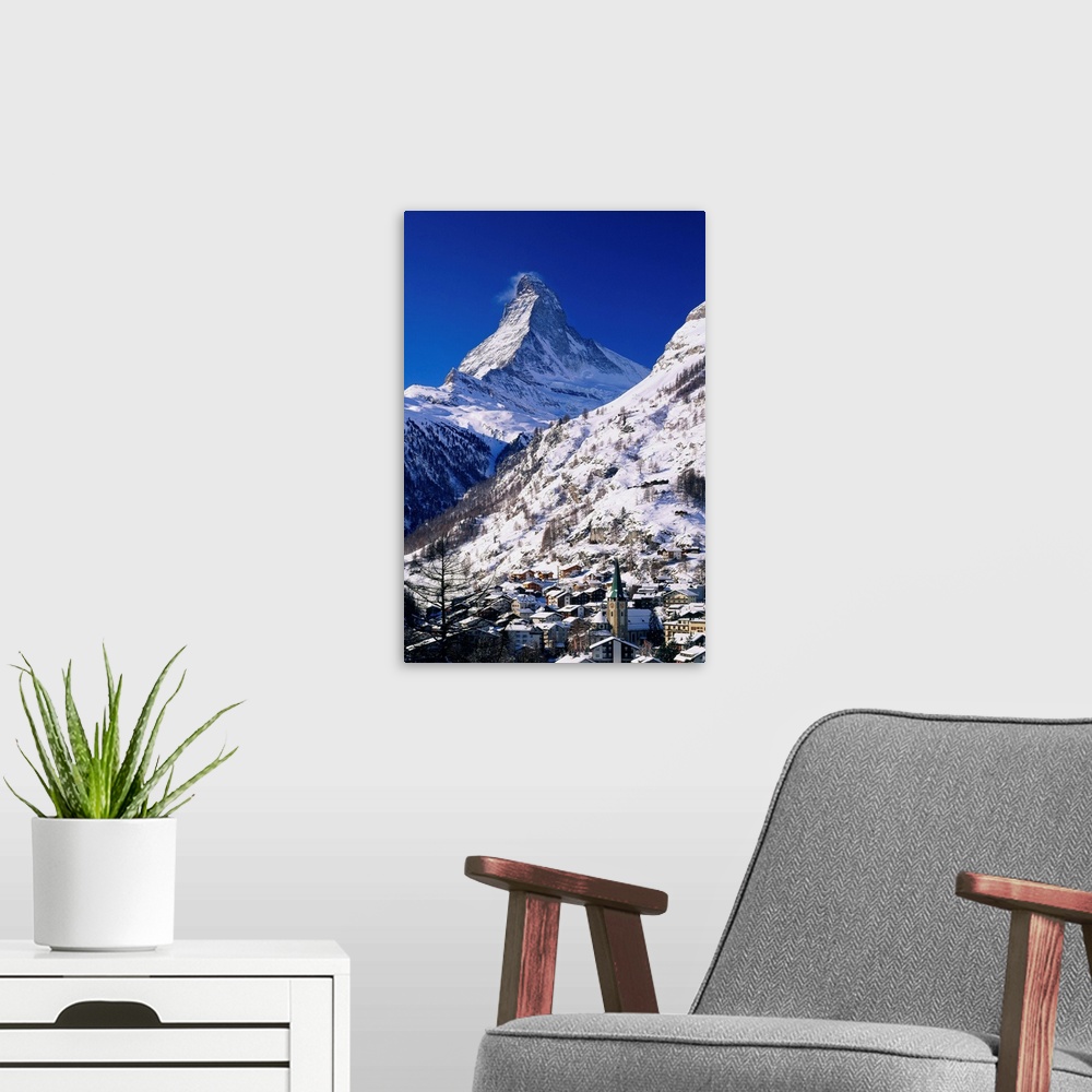 A modern room featuring Switzerland, Valais, Zermatt, view towards the village and Matterhorn mountain