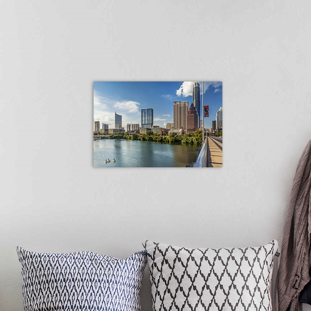 A bohemian room featuring Texas, Austin downtown skyline from Congress Ave. Bridge and Colorado River 360 Condominiums, The...