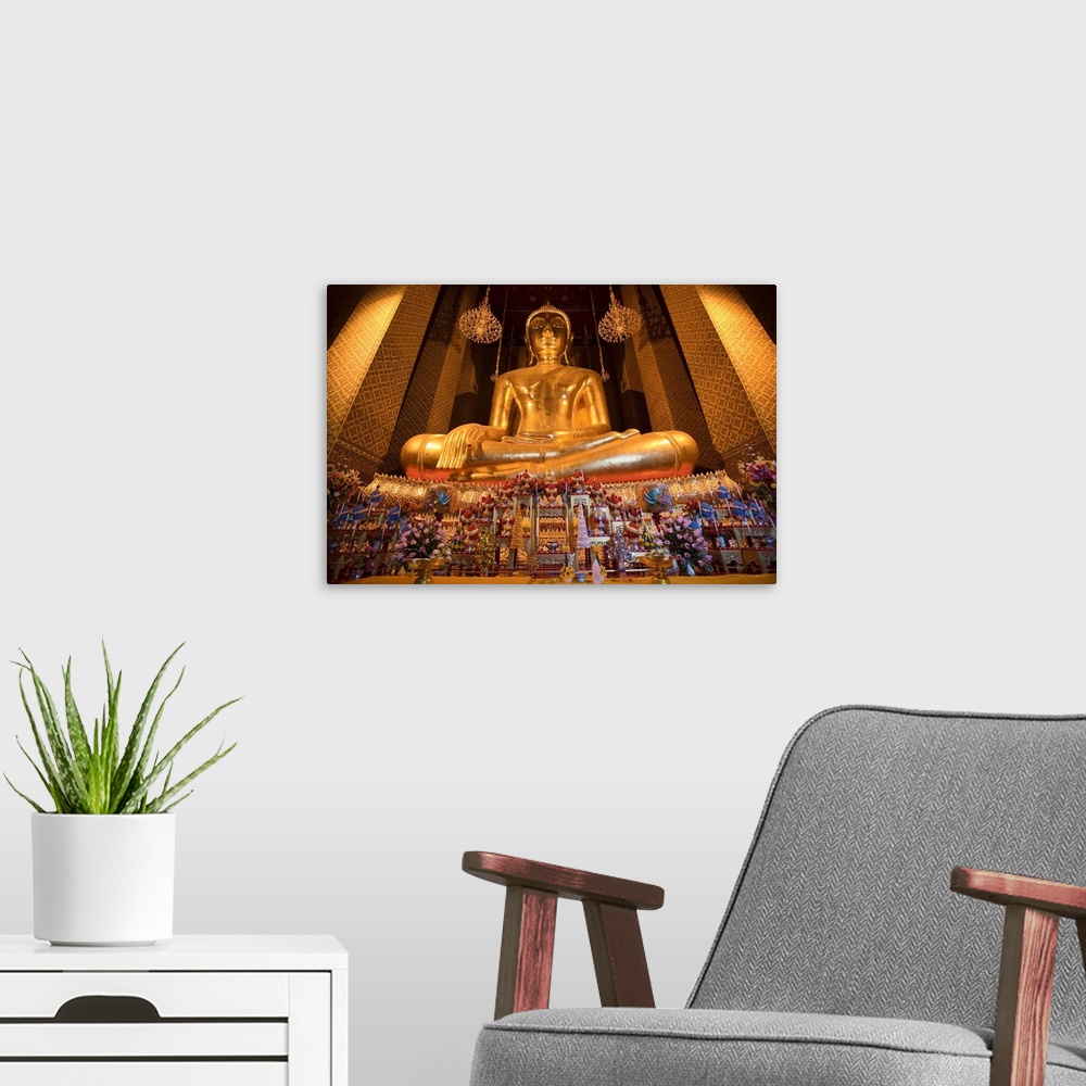 A modern room featuring Thailand, Bangkok, Wat Kalayanamit , golden Buddha in the temple
