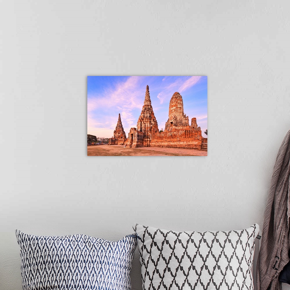 A bohemian room featuring Thailand, Central Thailand, Ayutthaya, Wat Chai Wattanaram at sunset.
