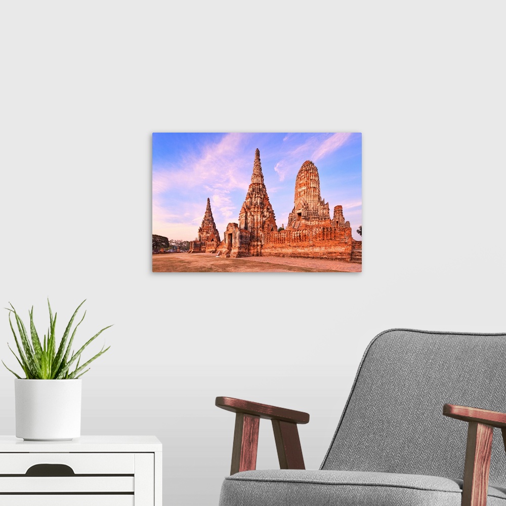 A modern room featuring Thailand, Central Thailand, Ayutthaya, Wat Chai Wattanaram at sunset.