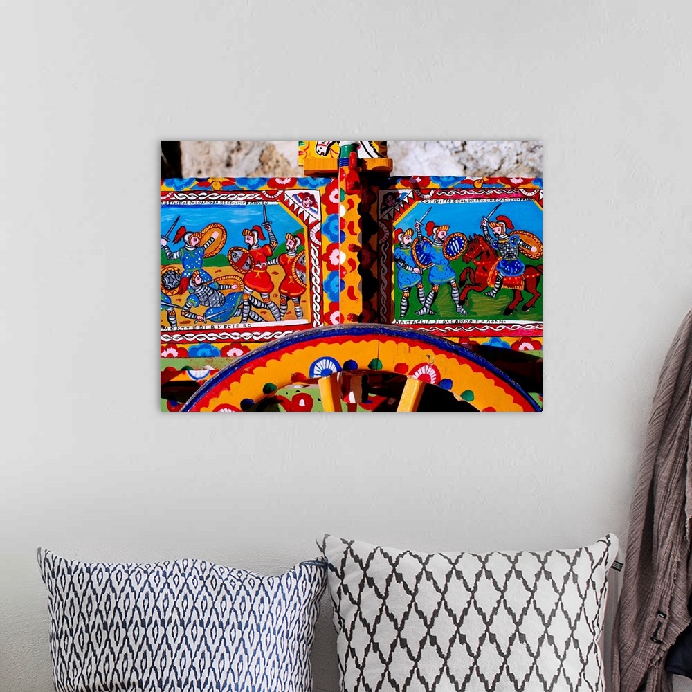 A bohemian room featuring Typical Sicilian cart