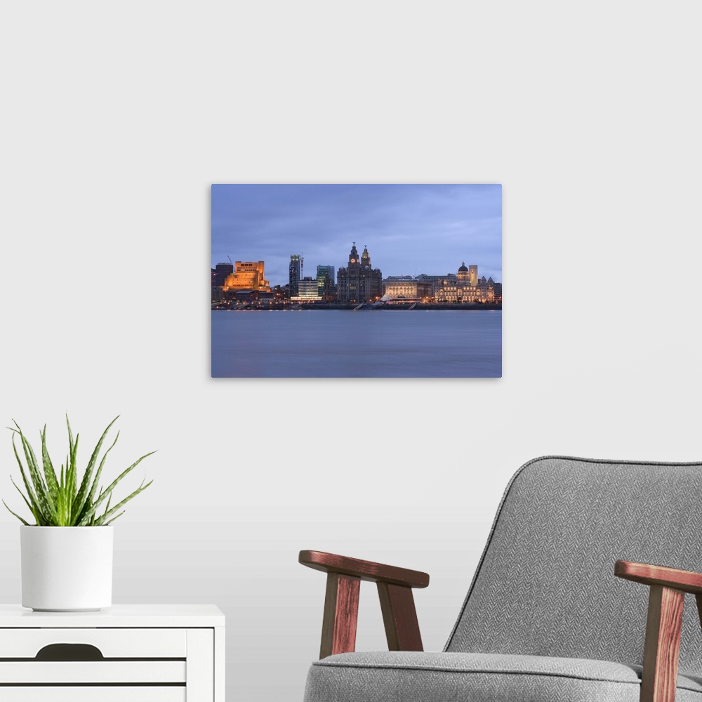 A modern room featuring United Kingdom, UK, England, Liverpool, Pier Head, skyline with Three Graces in background