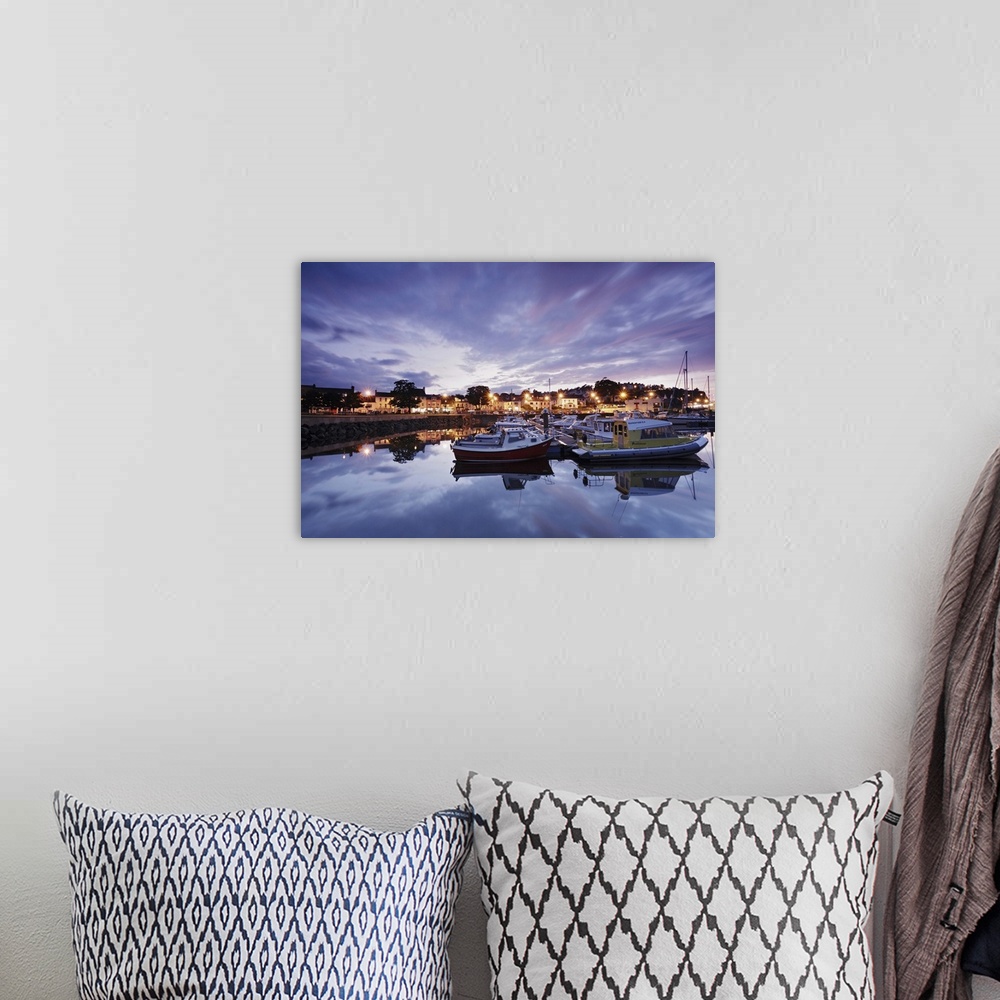 A bohemian room featuring UK, Northern Ireland, Ballycastle, View of the harbour with the village in background