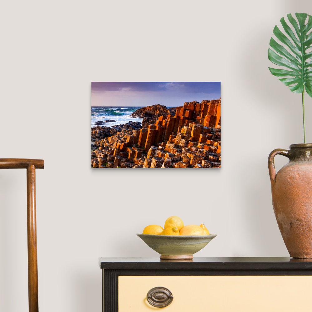 A traditional room featuring UK, Northern Ireland, Great Britain, Antrim, Giant's Causeway, Basalt Columns at sunset.