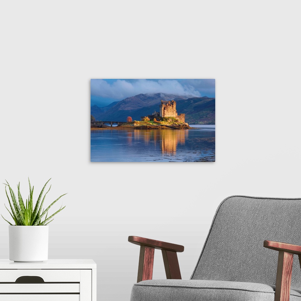 A modern room featuring UK, Scotland, Eilean Donan Castle, Dornie, view of the castle.