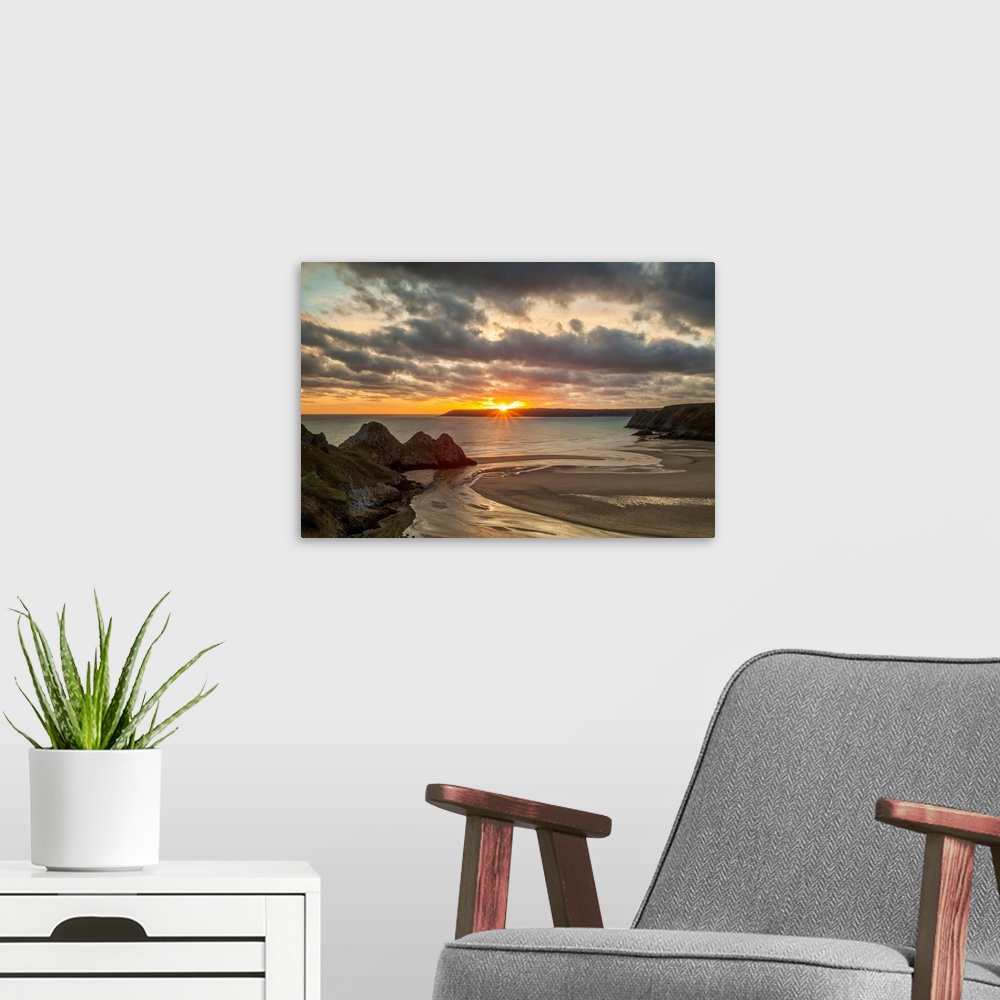A modern room featuring UK, Wales, Gower Peninsula, Great Britain, Three Cliffs Bay at sunset.