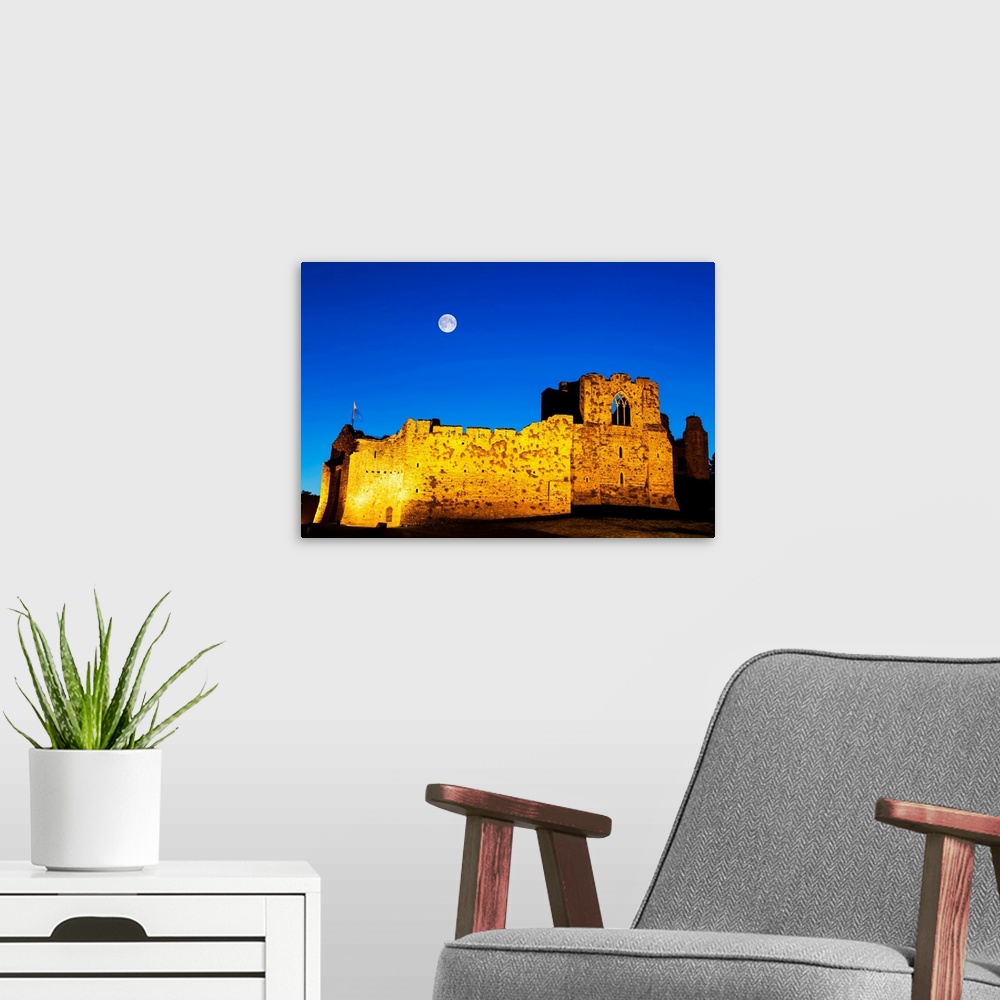 A modern room featuring UK, Wales, Gower Peninsula, Oystermouth Castle at Mumbles near Swansea by night.