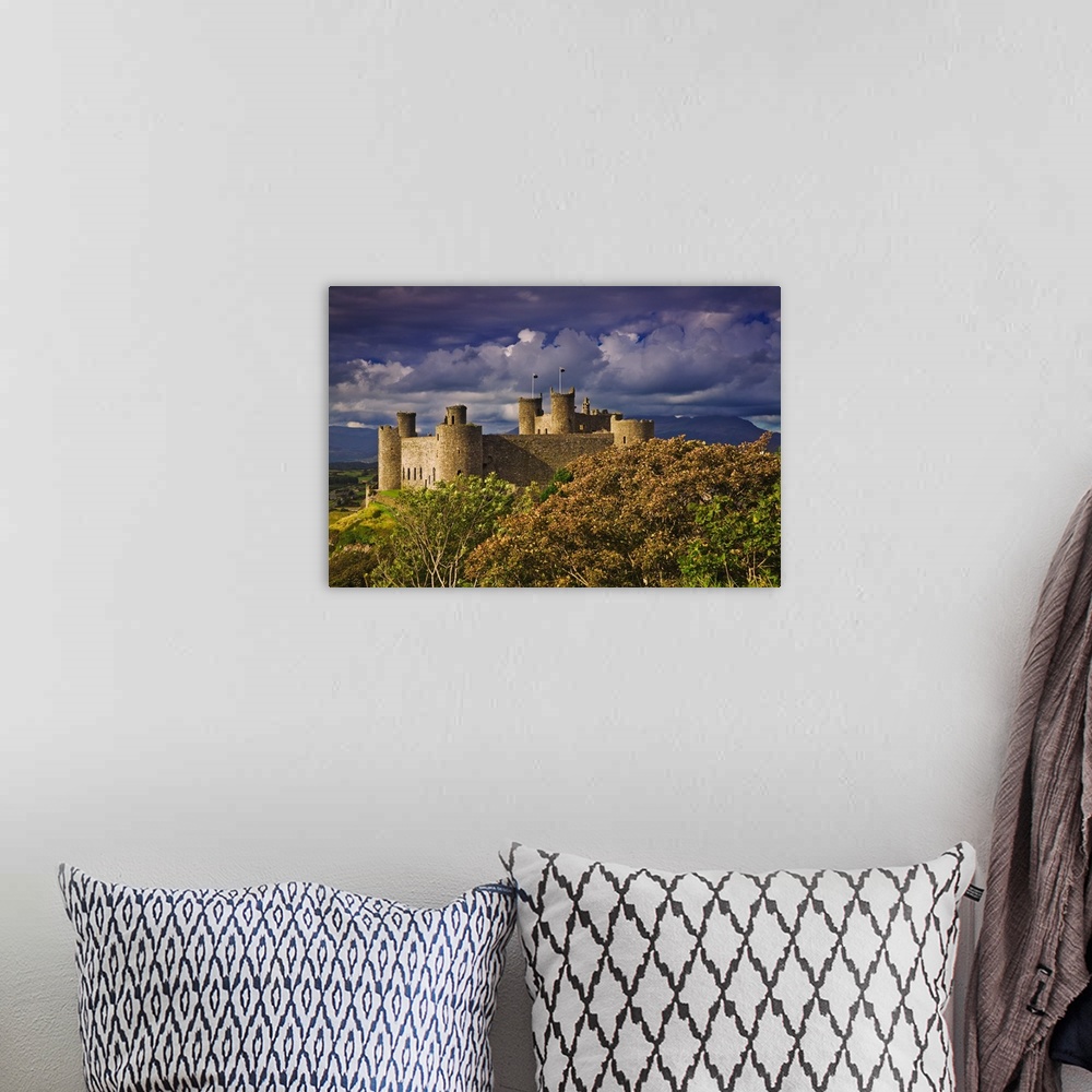A bohemian room featuring UK, Wales, Gwynedd, A view of the Harlech Castle, built by Edward I in 1289