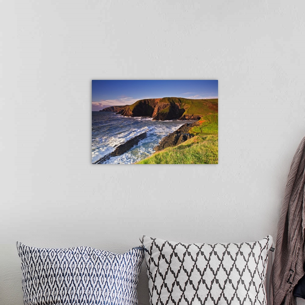 A bohemian room featuring UK, Wales, Pembrokeshire, Cliffs along the coast at Ceibwr Bay