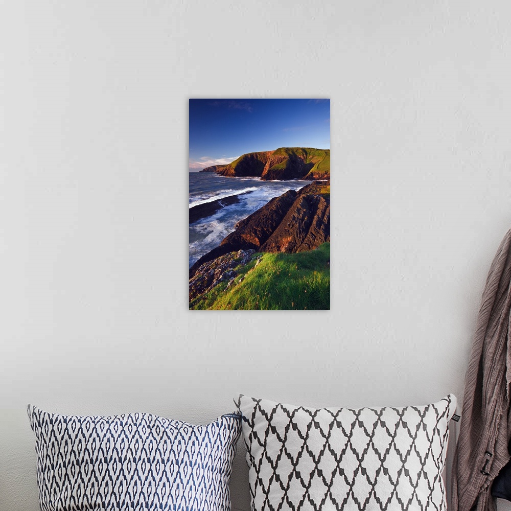 A bohemian room featuring Cliffs along the coast at Ceibwr Bay, near the seaside resort of Newport, in the Pembrokeshire Co...