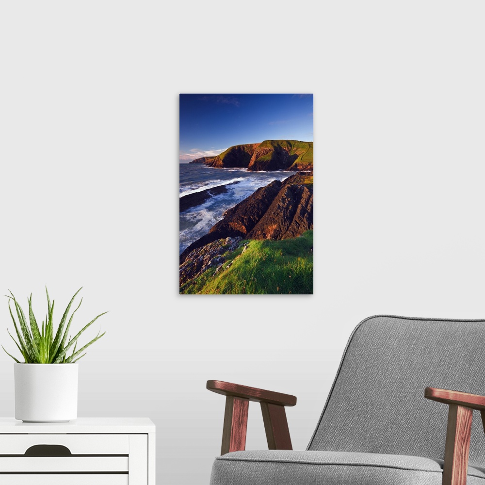 A modern room featuring Cliffs along the coast at Ceibwr Bay, near the seaside resort of Newport, in the Pembrokeshire Co...