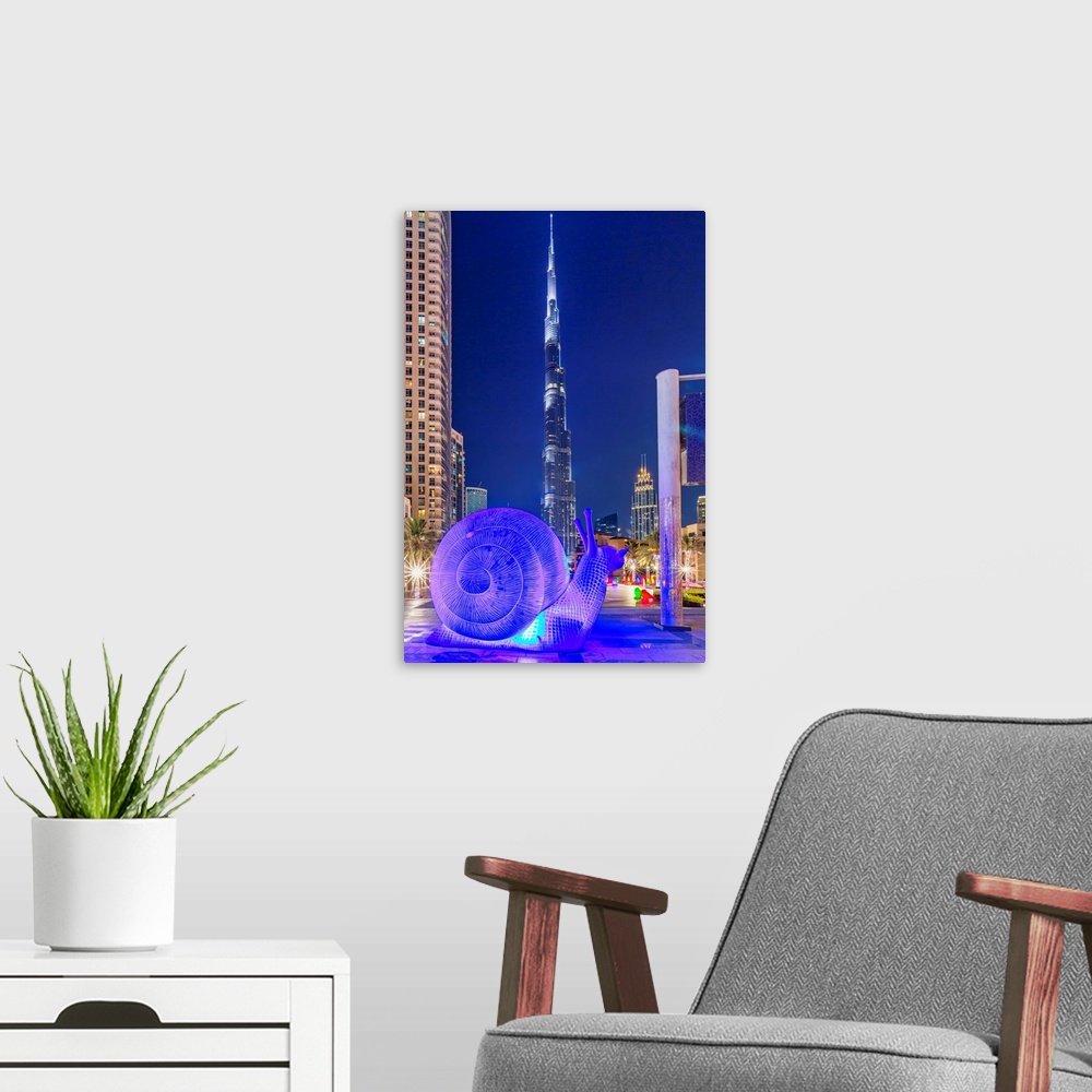 A modern room featuring United Arab Emirates, Dubai, Burj Plaza with Burj Khalifa, Tower, and Snail sculpture..