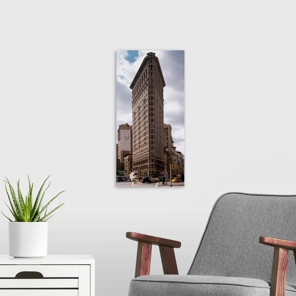A modern room featuring United States, New York, Flatiron Building., New York's first skyscraper