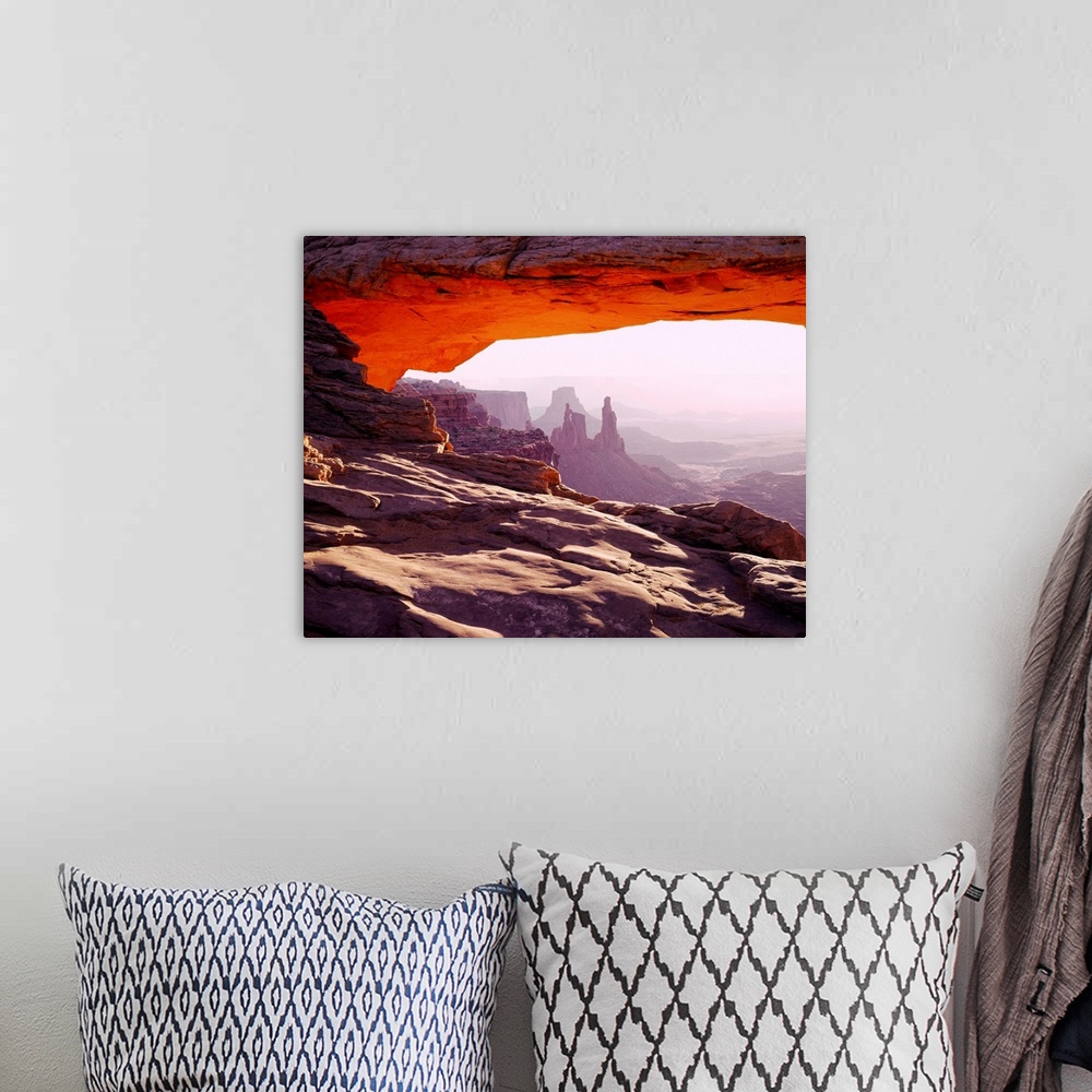 A bohemian room featuring United States, Utah, Canyonlands National Park, Mesa Arch at sunrise
