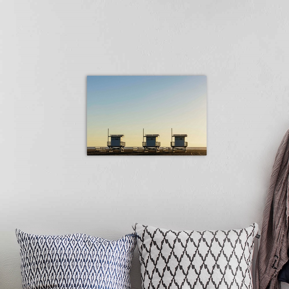 A bohemian room featuring USA, California, Los Angeles, Venice Beach, Lifeguard towers at sunset.